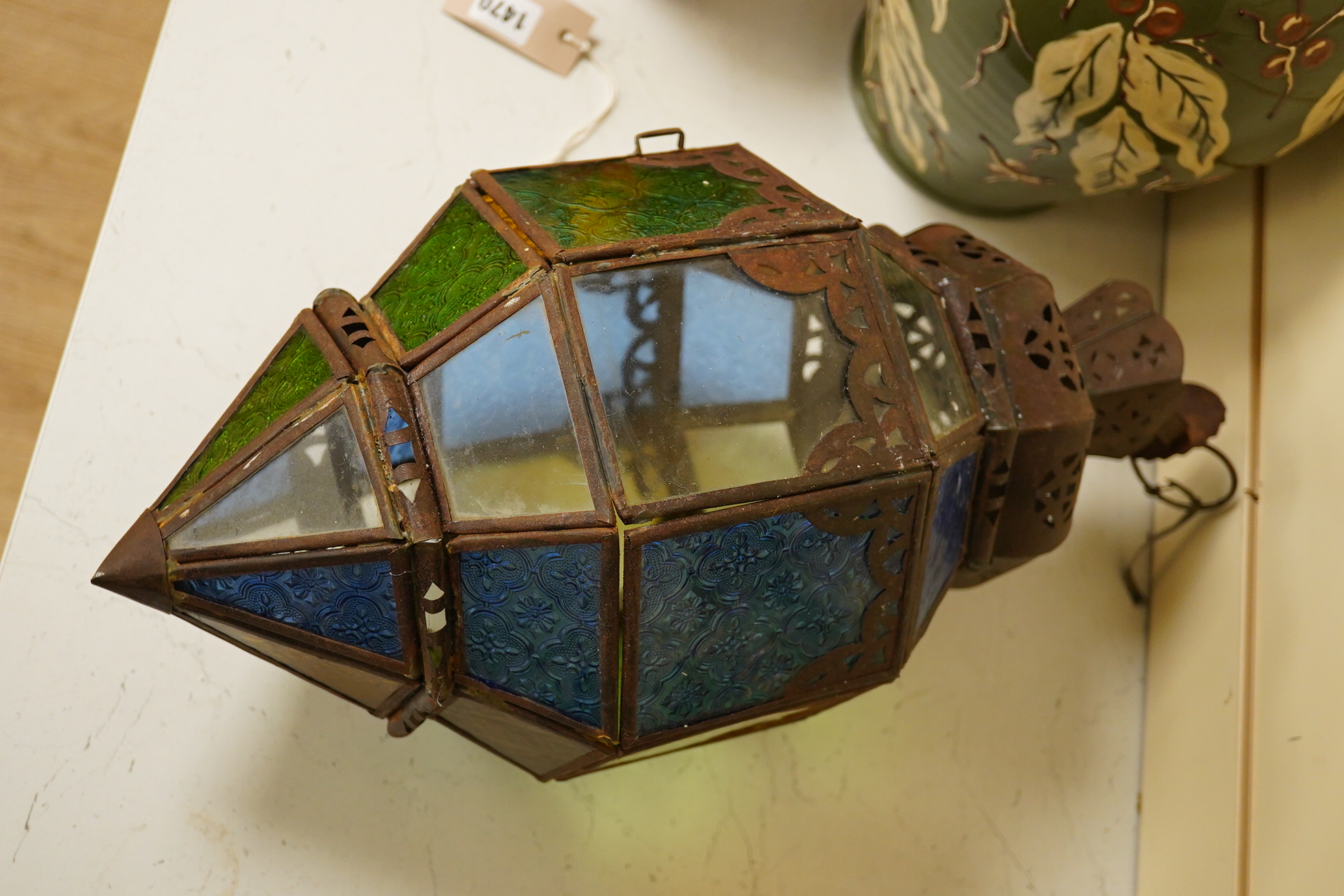 A Moorish coloured glass and tinplate lantern, 50cm high. Condition - poor